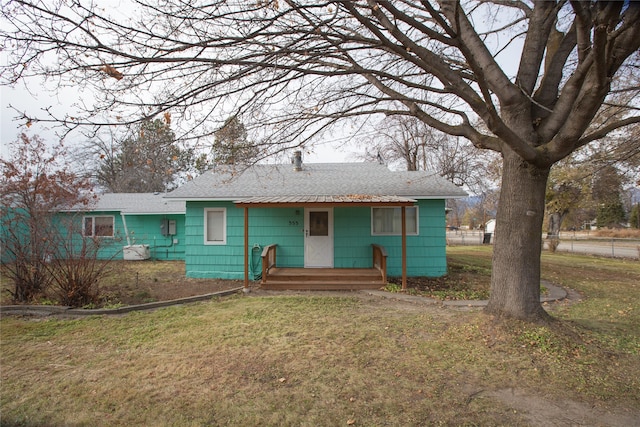 ranch-style house with a front yard