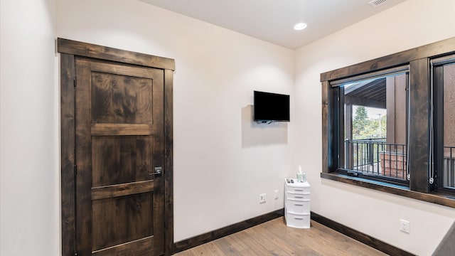 bedroom featuring light hardwood / wood-style floors