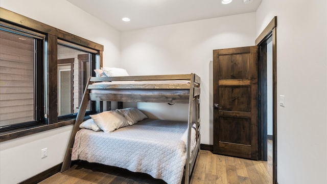 bedroom with light wood-type flooring