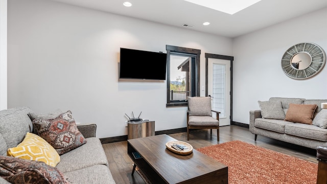 living room with wood-type flooring