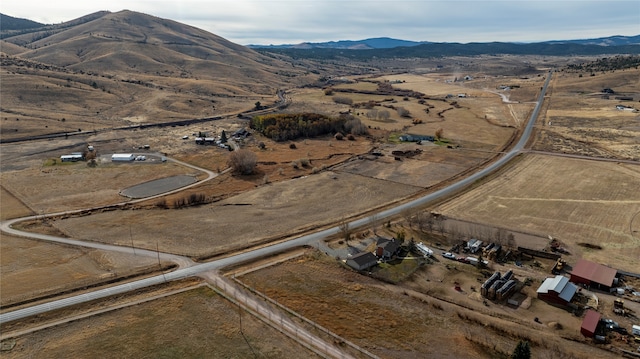 bird's eye view with a mountain view and a rural view