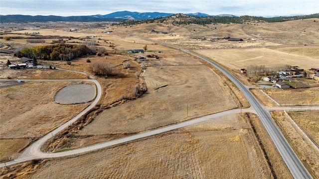 bird's eye view with a mountain view