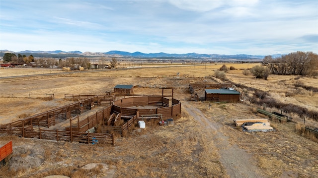 aerial view with a mountain view and a rural view