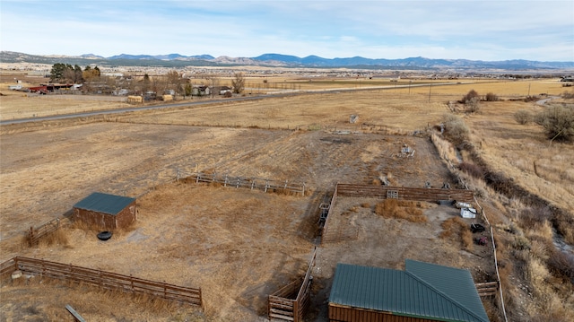 aerial view with a mountain view and a rural view