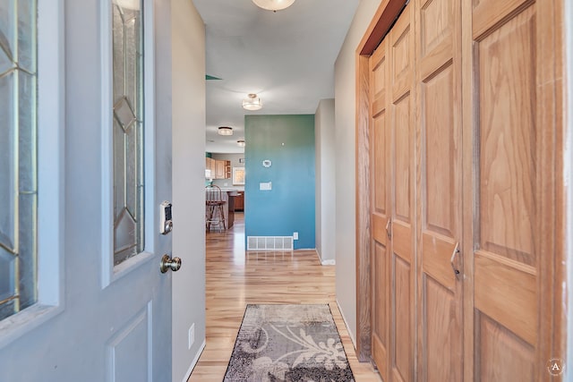 foyer entrance featuring light hardwood / wood-style floors