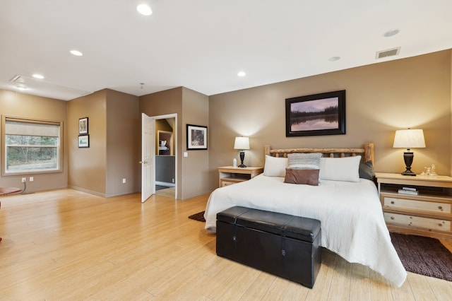 bedroom with light wood-type flooring