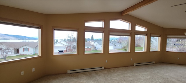 unfurnished sunroom with a residential view, carpet floors, a baseboard heating unit, and baseboard heating
