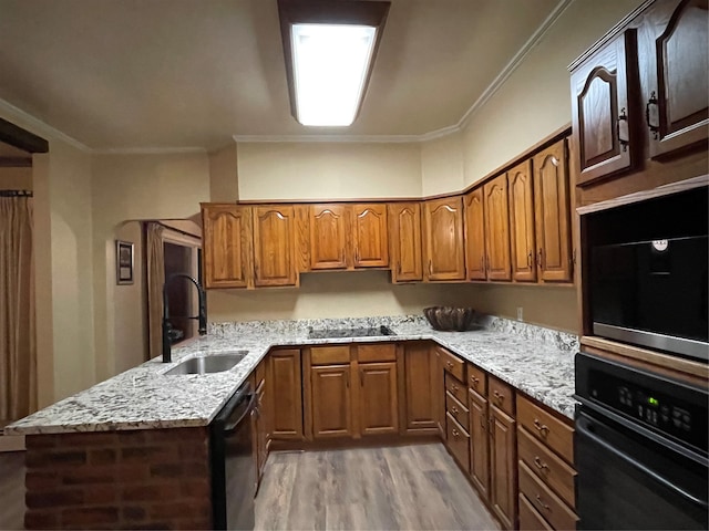 kitchen with black oven, light stone counters, and wood ceiling