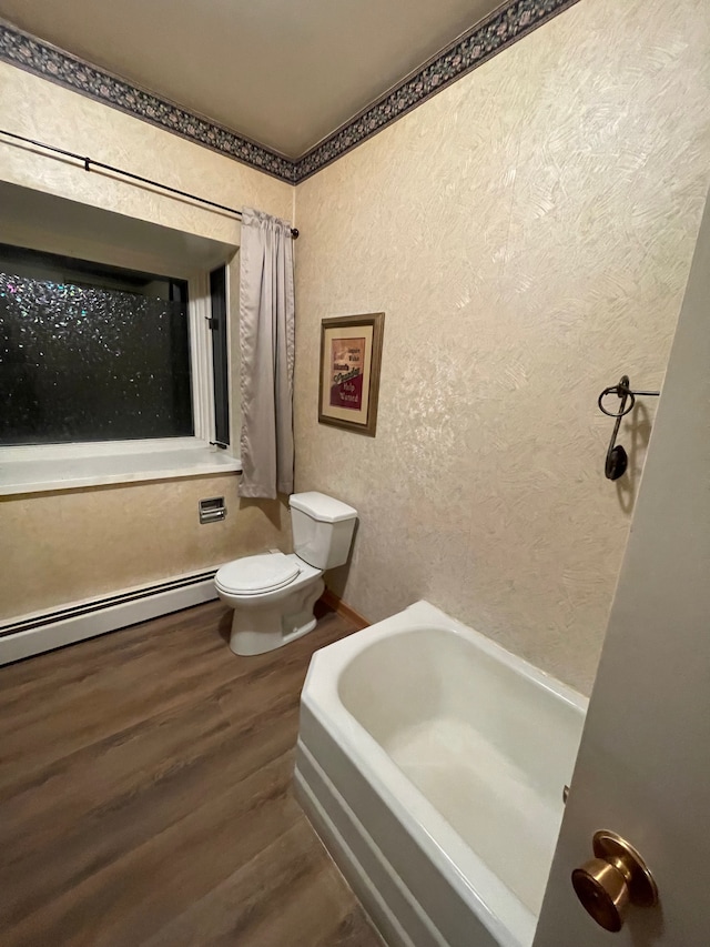 bathroom featuring sink, wood-type flooring, and a textured ceiling