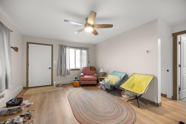 121 Mill Ave, Whitefish, MT 59937 - living area with light wood-style floors and a ceiling fan