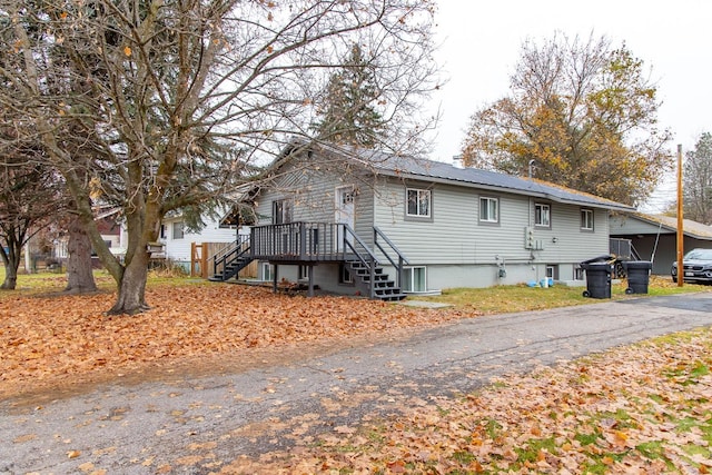 121 Mill Ave, Whitefish, MT 59937 - view of home's exterior featuring stairs and a wooden deck