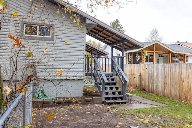 121 Mill Ave, Whitefish, MT 59937 - back of property featuring stairs and a wooden deck