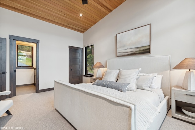 bedroom featuring light colored carpet, vaulted ceiling, and wood ceiling