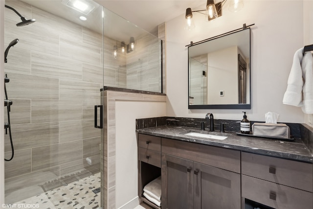 bathroom with vanity and walk in shower