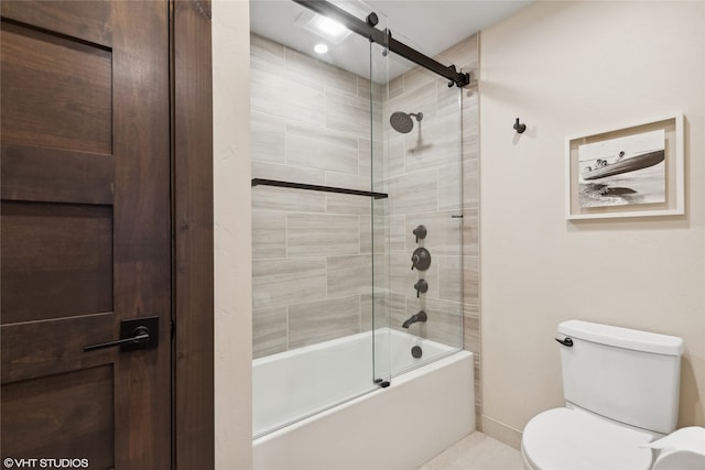 bathroom featuring toilet and enclosed tub / shower combo