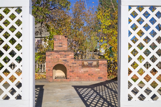 view of patio / terrace featuring a fireplace