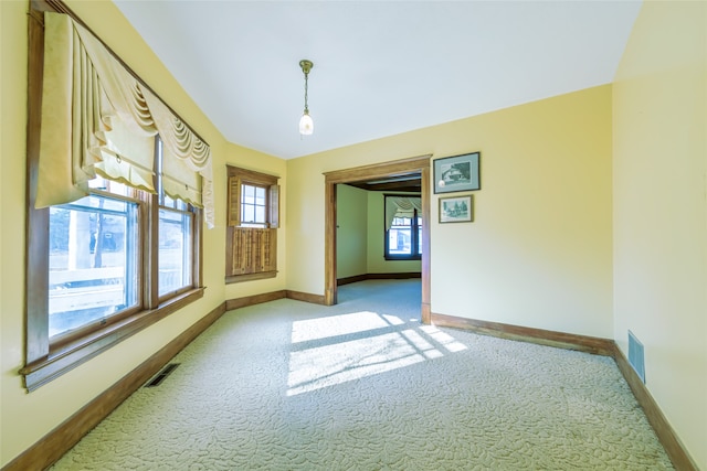 view of carpeted spare room