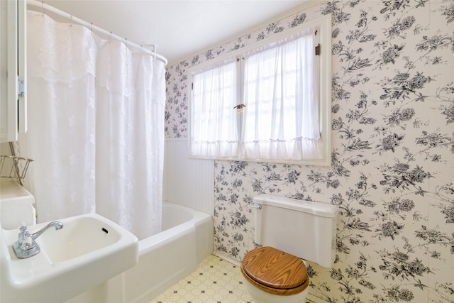 full bathroom with shower / bath combination with curtain, toilet, and sink