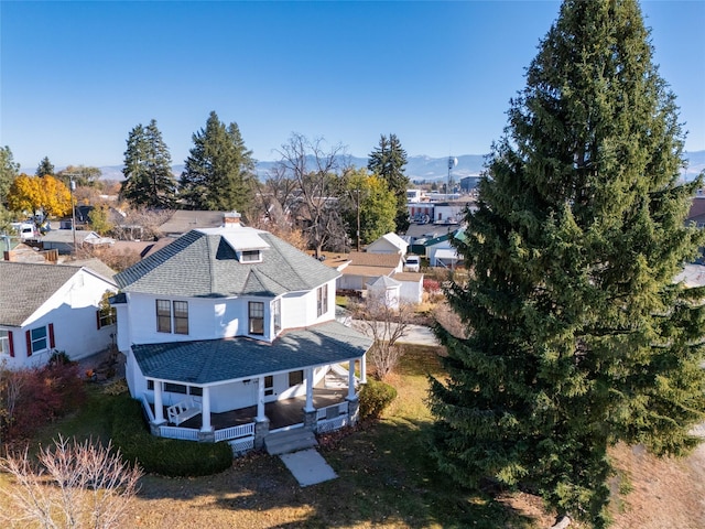 200 N 5th St, Hamilton, MT 59840 - aerial view of residential area featuring a mountainous background