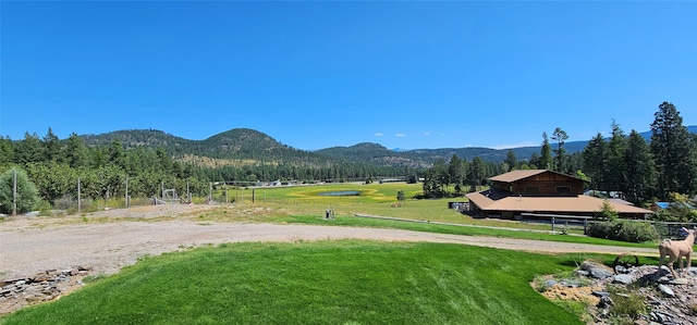 view of mountain feature with a rural view