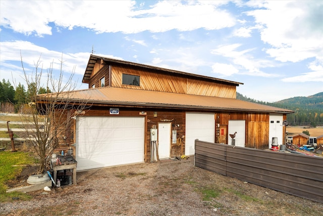 exterior space featuring a mountain view