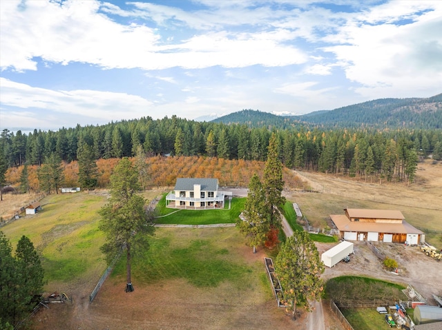 birds eye view of property with a mountain view