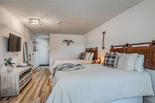 180 Vista Ln Unit 254, Bigfork, MT 59911 - bedroom with light wood-type flooring