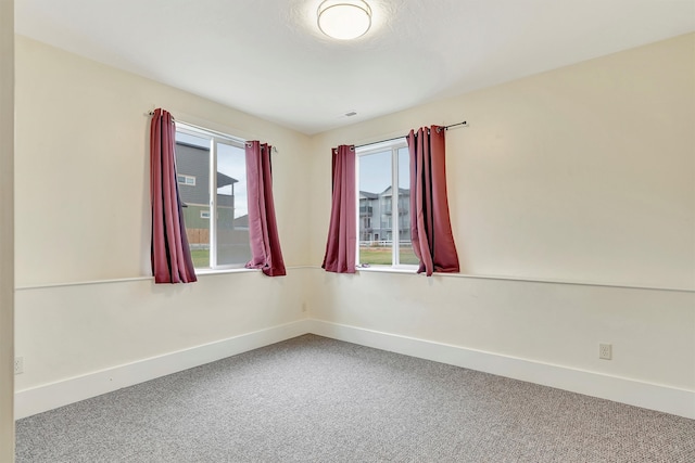 view of carpeted spare room