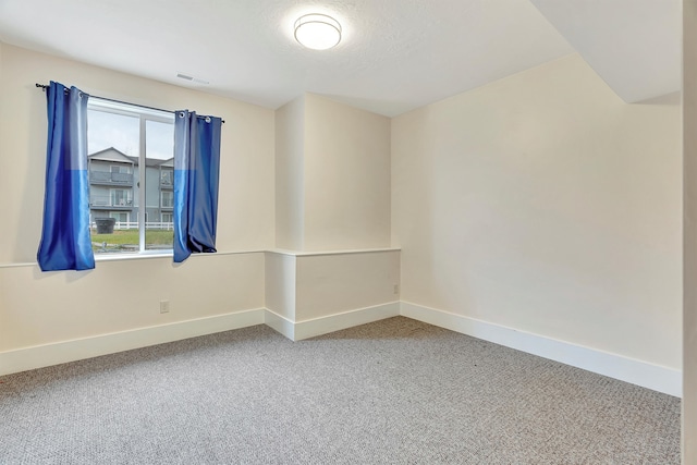 empty room with carpet floors