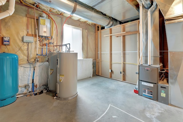 utility room with electric water heater and heating unit