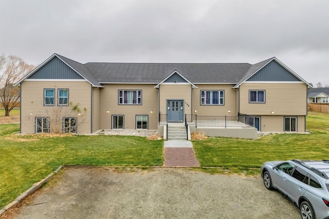 bi-level home with a front yard