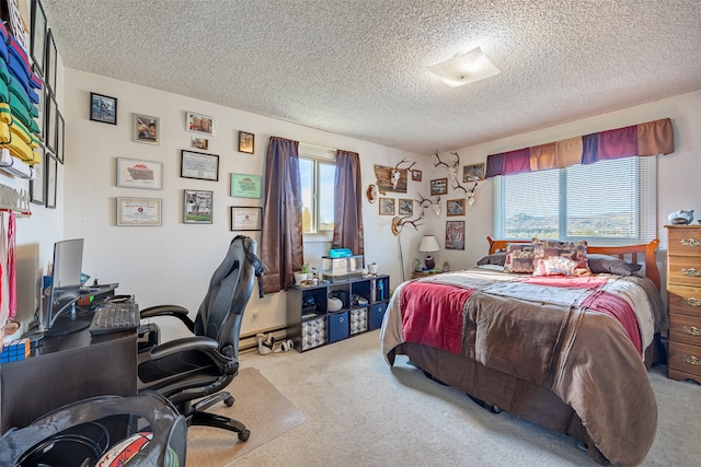 carpeted bedroom featuring a textured ceiling and multiple windows