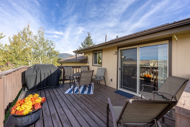 wooden deck with area for grilling