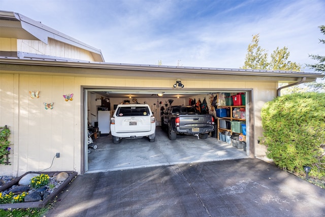 garage featuring water heater