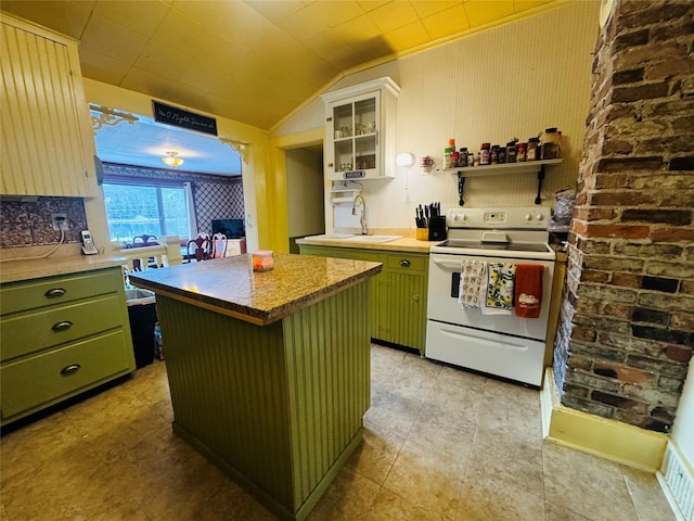 kitchen with vaulted ceiling, a center island, green cabinetry, and white electric range oven