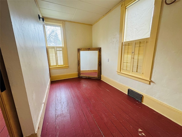 unfurnished room featuring hardwood / wood-style floors