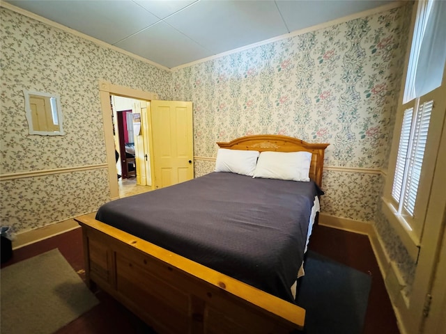 bedroom with crown molding