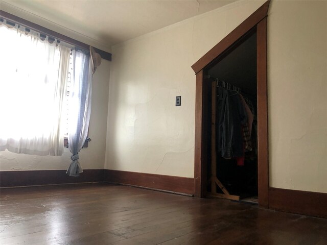 508 1st St W, Polson, MT 59860 - spare room featuring wood-type flooring and baseboards