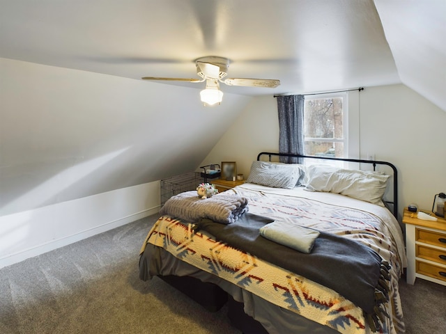 carpeted bedroom featuring vaulted ceiling and ceiling fan