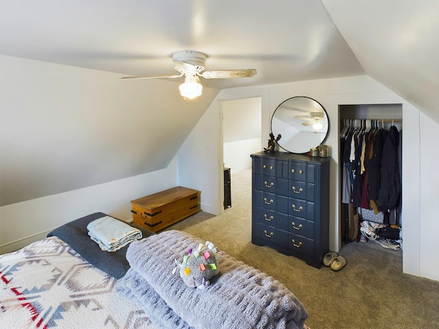 bedroom featuring carpet floors, vaulted ceiling, a closet, and ceiling fan