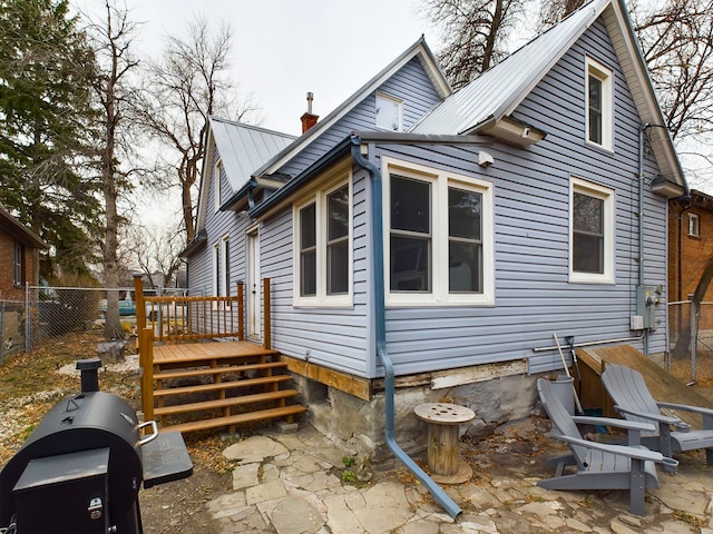 view of home's exterior featuring a deck