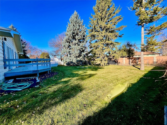 view of yard featuring a deck