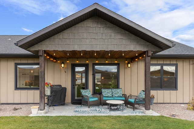 rear view of property with a patio and an outdoor hangout area