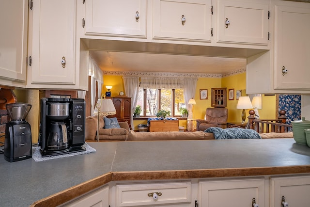 4 Courtier Rd, Thompson Falls, MT 59873 - kitchen with dark countertops, white cabinetry, and open floor plan