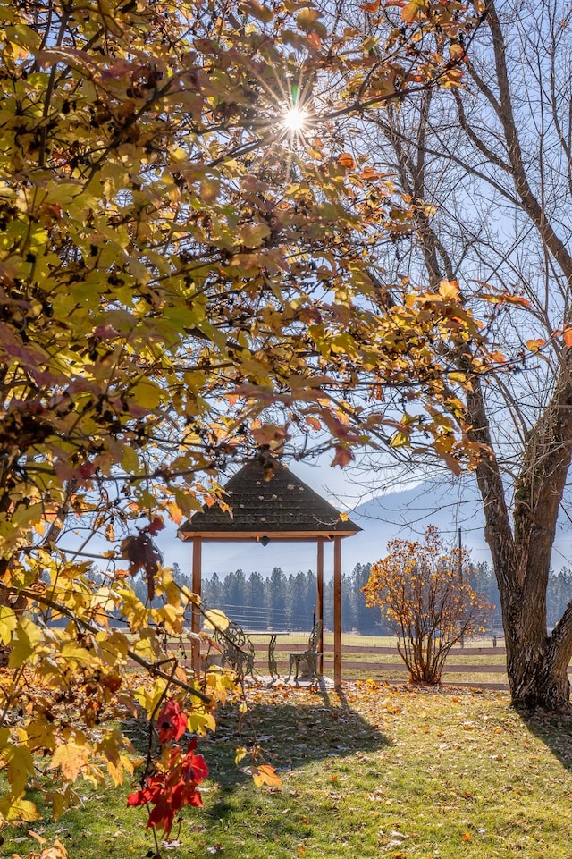 view of yard with a gazebo and a rural view