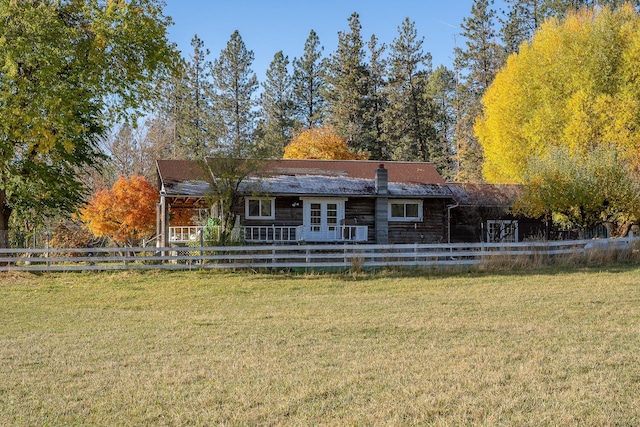 4 Courtier Rd, Thompson Falls, MT 59873 - back of house featuring a chimney and french doors