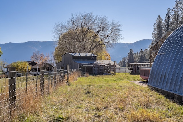 4 Courtier Rd, Thompson Falls, MT 59873 - view of yard with a mountain view and an outbuilding