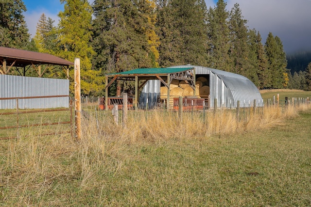 4 Courtier Rd, Thompson Falls, MT 59873 - view of outdoor structure with a view of trees