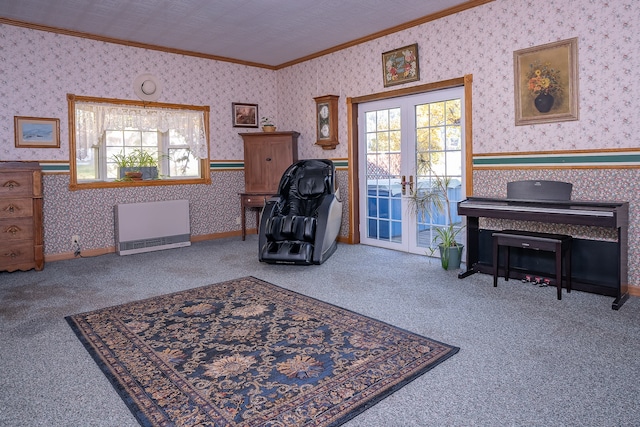 sitting room featuring a wealth of natural light, french doors, carpet, and crown molding