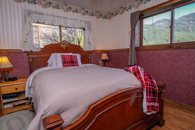 bedroom featuring wood-type flooring